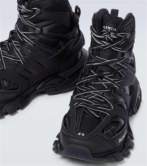 high top balenciaga track sneakers.